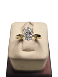 Oval Diamond Engagement Ring in 18Kt Yellow Gold and Platinum