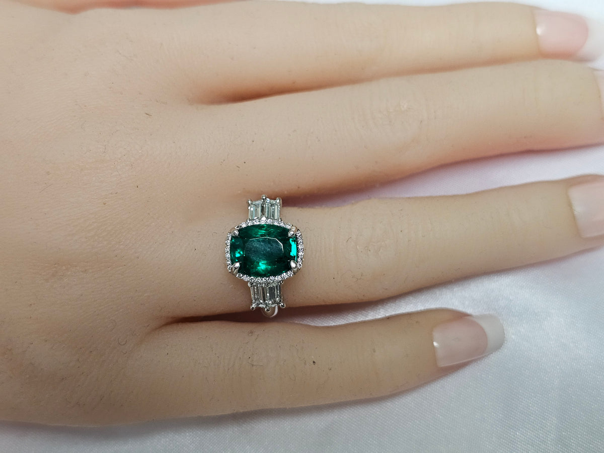 Emerald with Baguette Diamonds in Platinum Ring