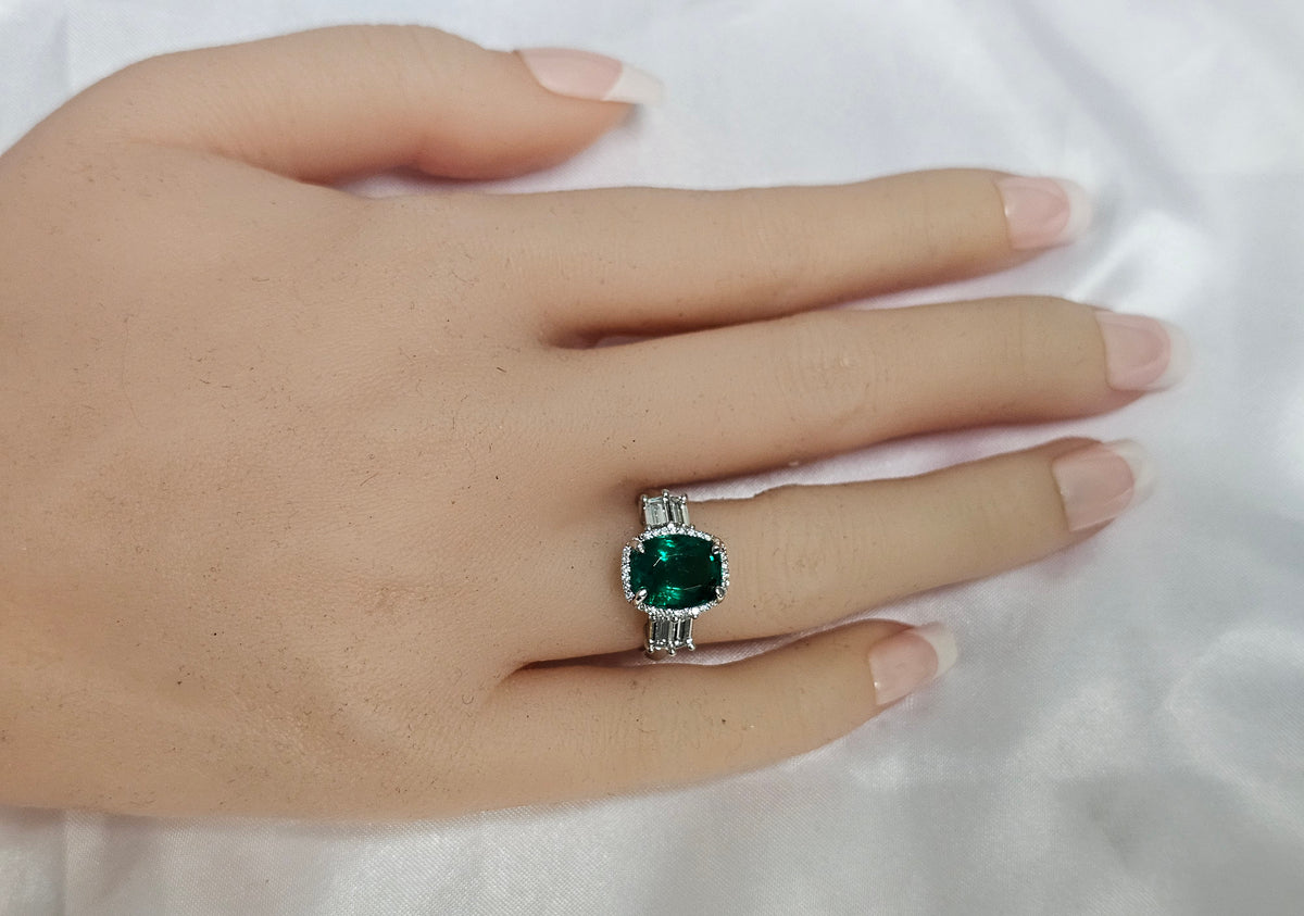 Emerald with Baguette Diamonds in Platinum Ring