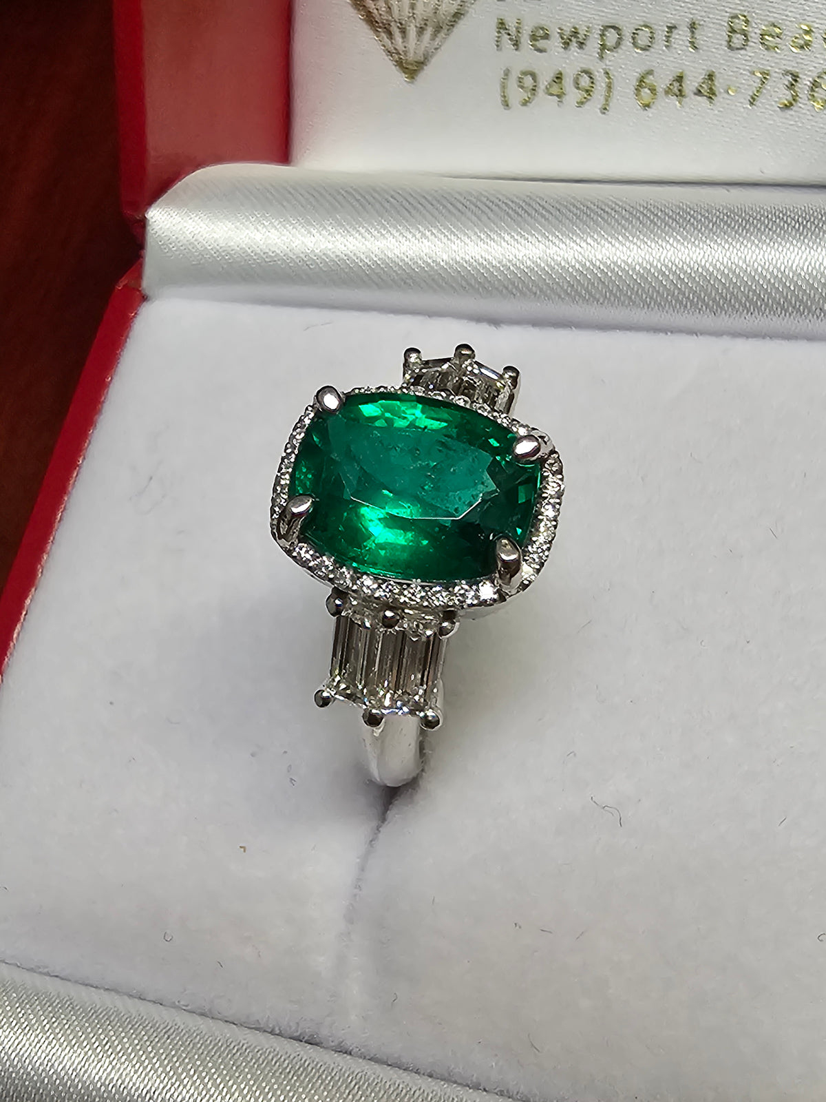 Emerald with Baguette Diamonds in Platinum Ring