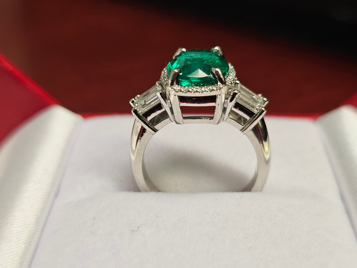 Emerald with Baguette Diamonds in Platinum Ring