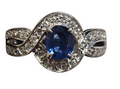 Blue Sapphire Twisted Halo Diamond Ring in 14 Karat White Gold