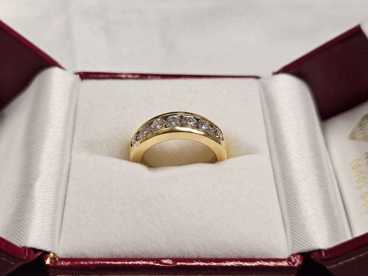 Ladies Wedding Band in 14 Karat Yellow Gold with Diamonds