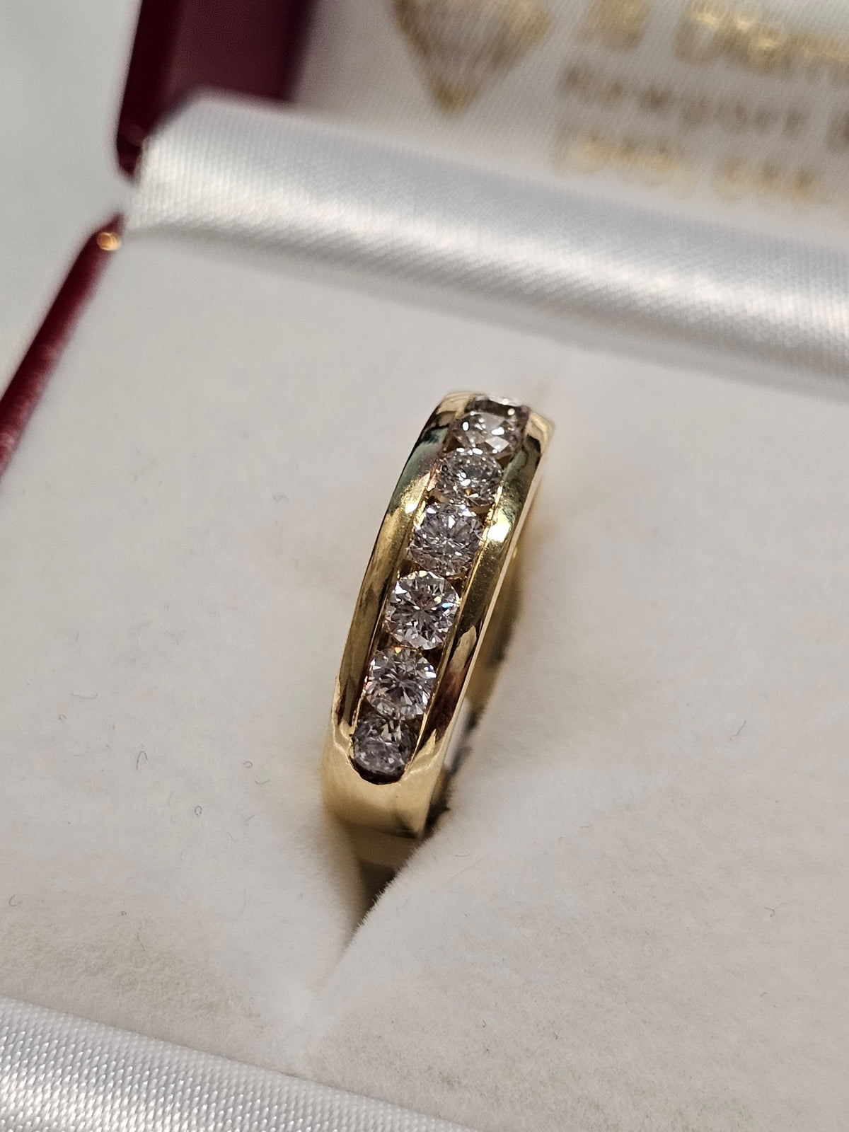 Ladies Wedding Band in 14 Karat Yellow Gold with Diamonds