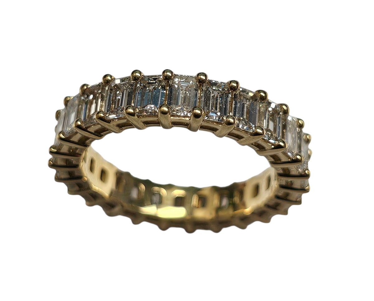 Eternity Band Ring with 3.58 Carats of Emerald Cut Diamonds in 18 Karat Yellow Gold