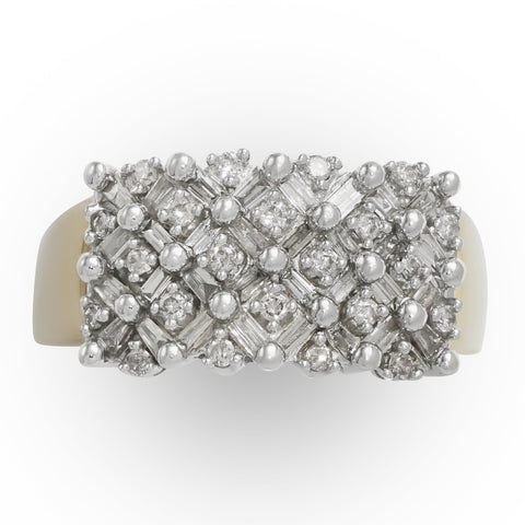 Two-Tone 14 Kt White Gold Baguette and Round Diamond Ring