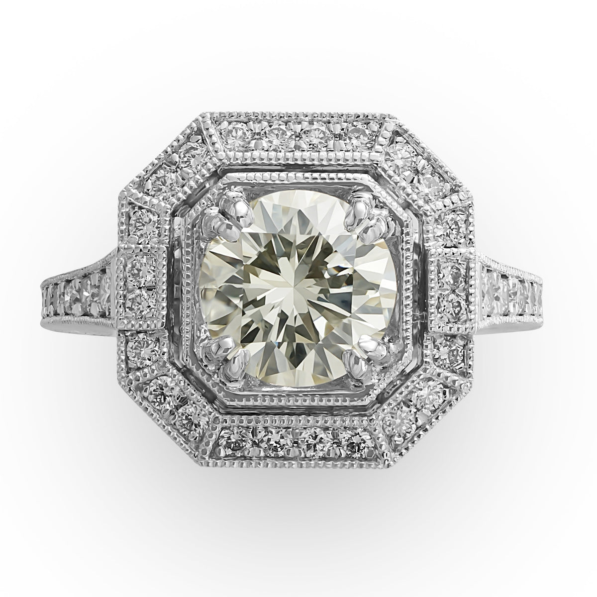 Pale Yellow Diamond in Engraved Ring