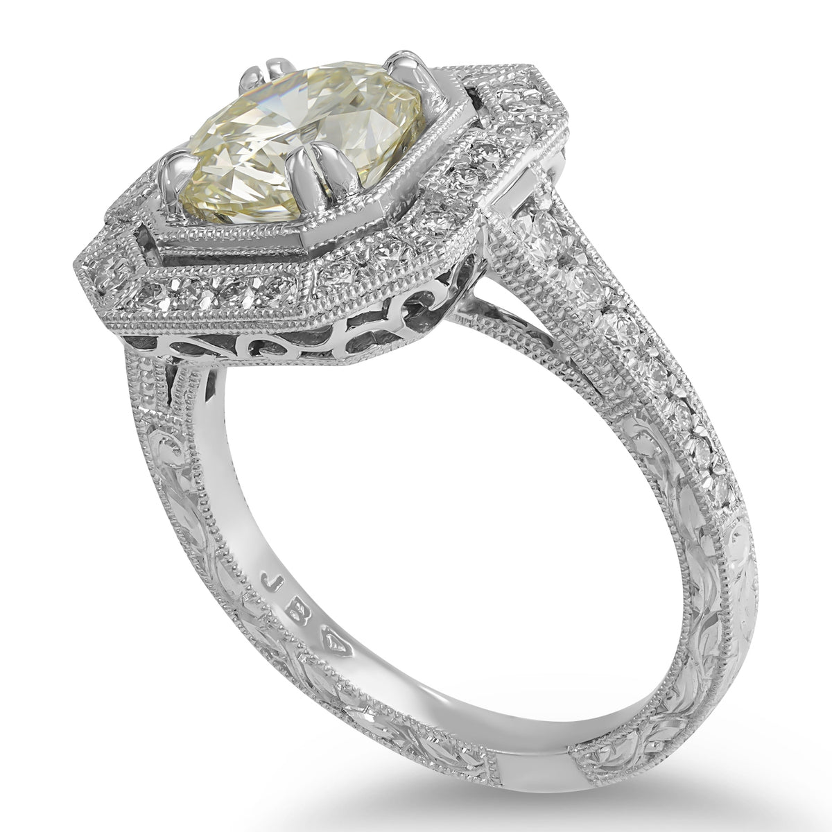 Pale Yellow Diamond in Engraved Ring