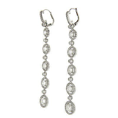 Round Diamond Dangling Earrings in Platinum
