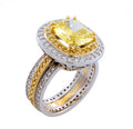 Ladies Ring with Fancy Intense Yellow Diamond in 18 Kt Two Tone